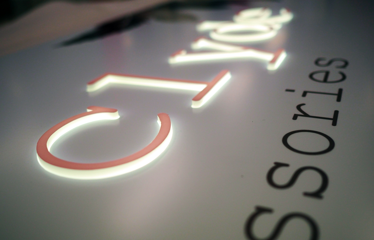 Custom illuminated signage with 3D lettering