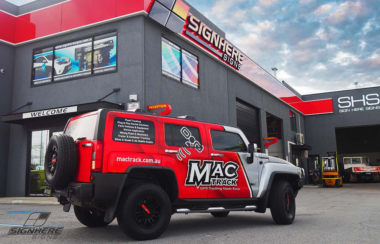 A vehicle wrap for Mac Track GPS tracking