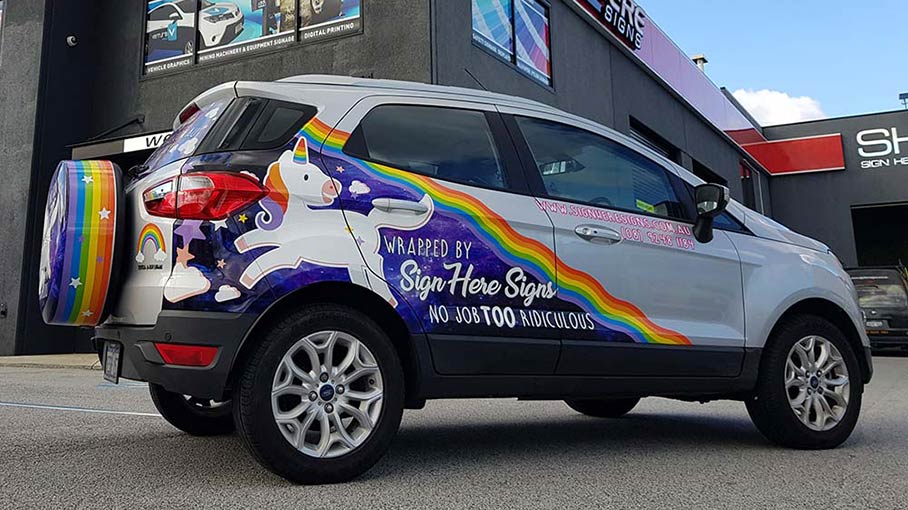 The Sign Here Signs signature Unicorn vehicle wrap.