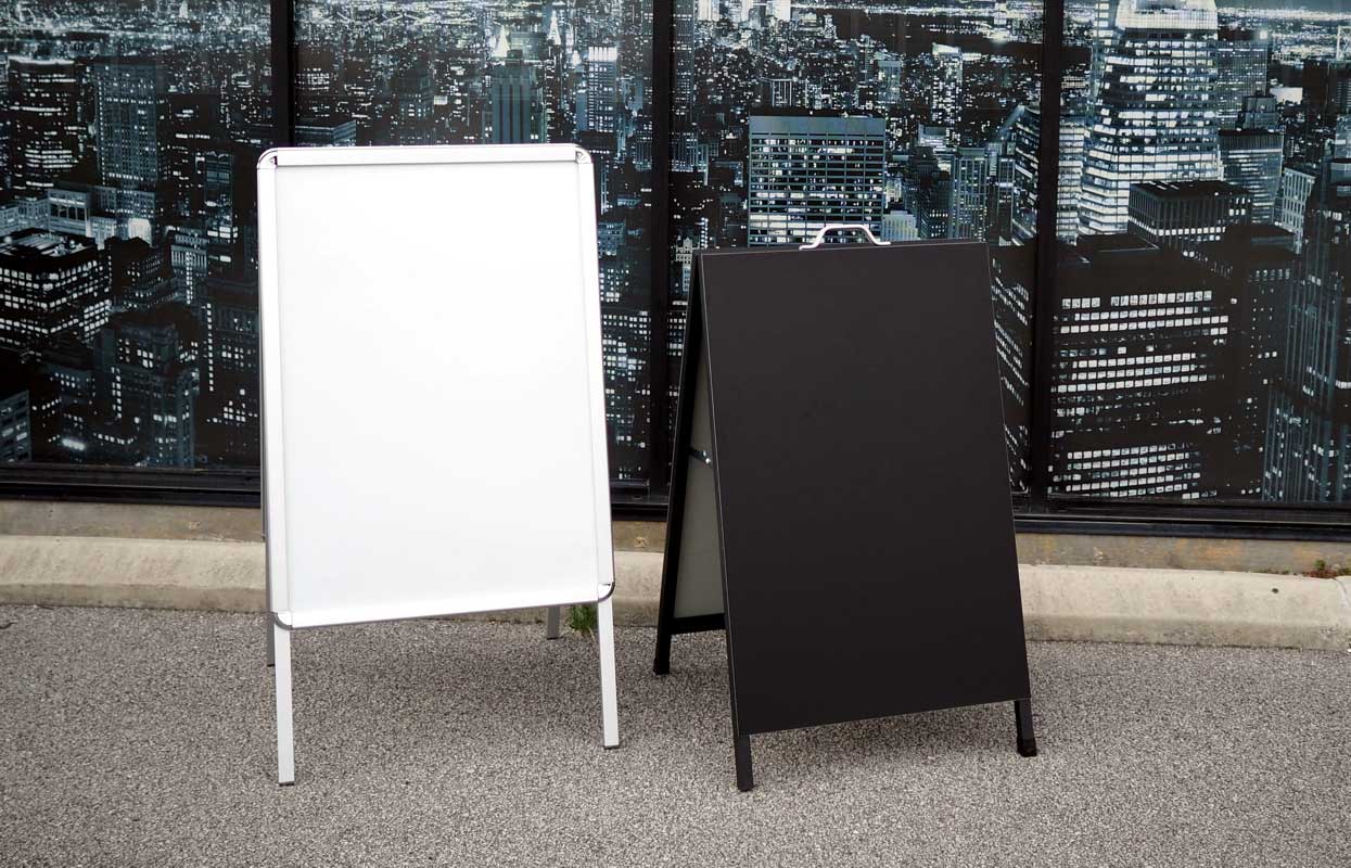 Whiteboards, sandwich boards and simple portable displays.