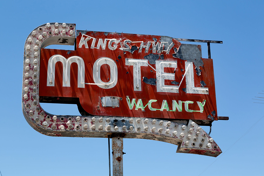 Old Motel sign on King's Highway in California.