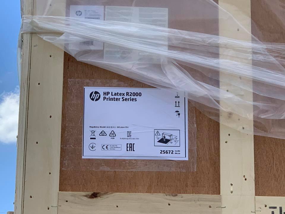 Unboxing our new HP Latex R2000 Printer at Sign Here Signs