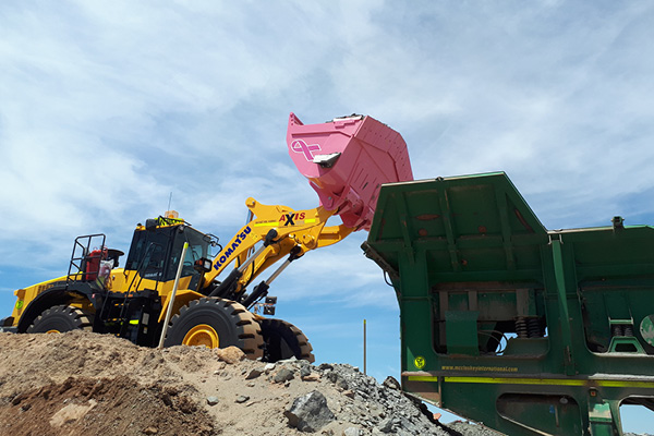 Komatsu pink bucket for breast cancer awareness