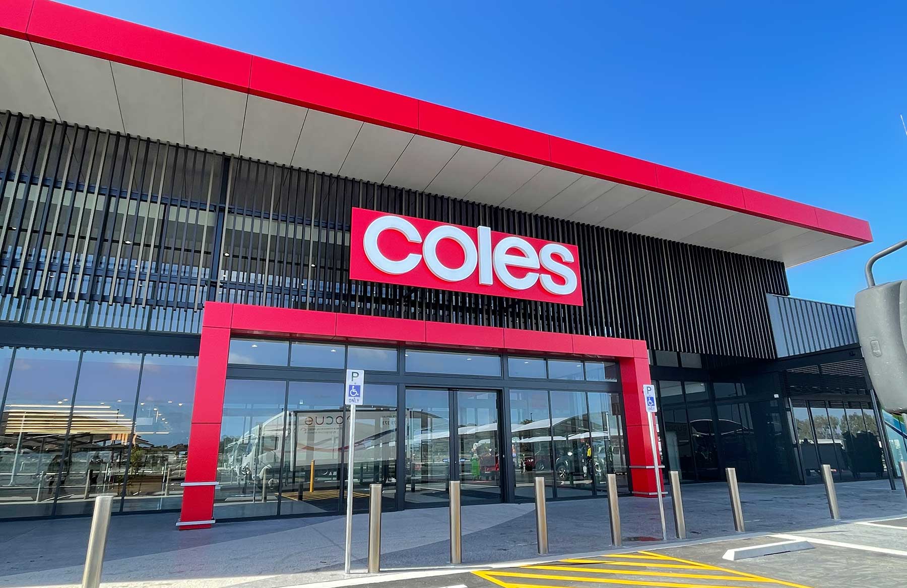 Coles and Liquorland retail signage manufactured and installed by Sign Here Signs
